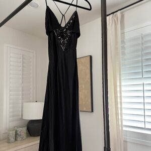 Black slip dress with lace detail
